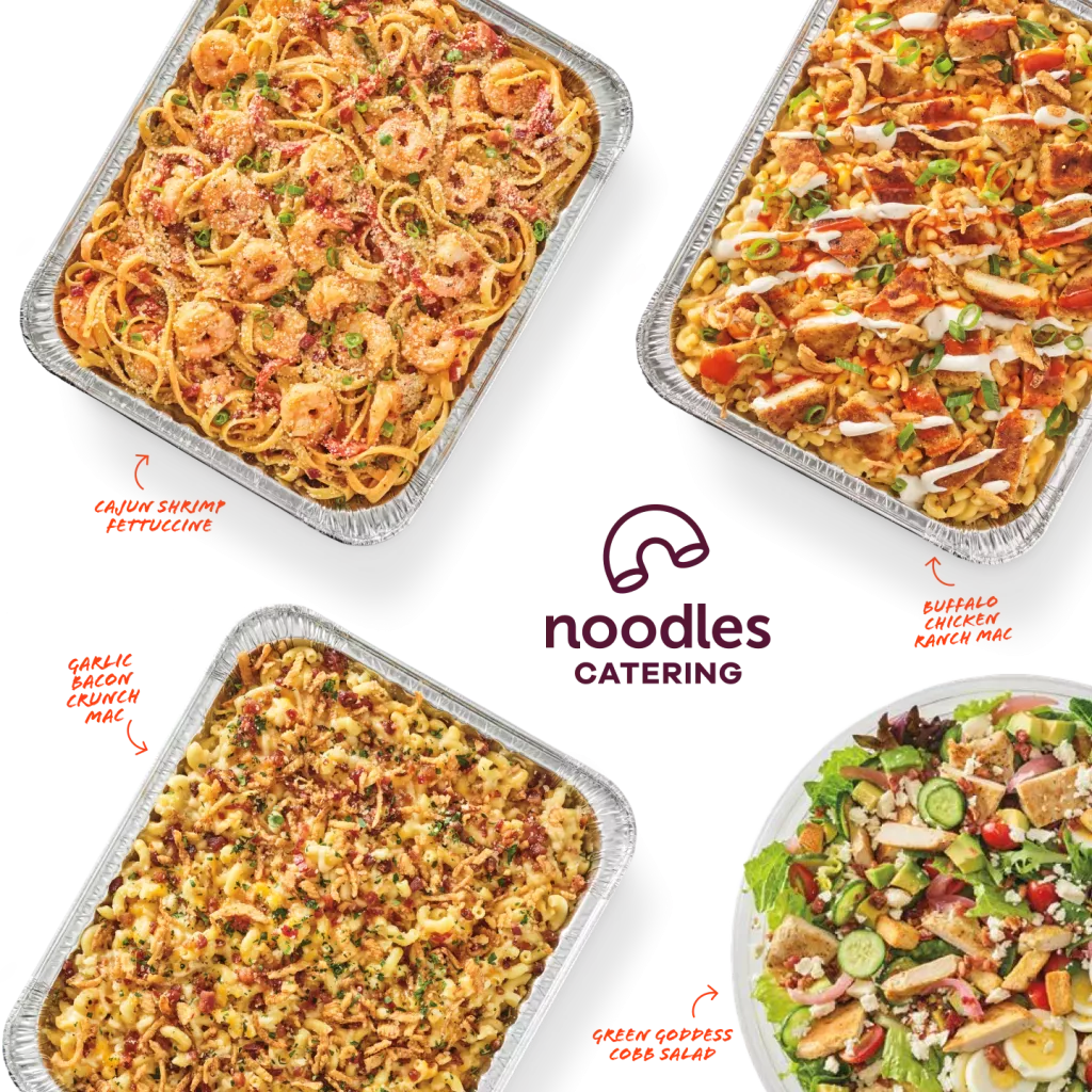 Noodles catering pans of Buffalo chicken ranch mac, cajun shrimp fettuccine, garlic bacon crunch mac and green goddess cobb salad.