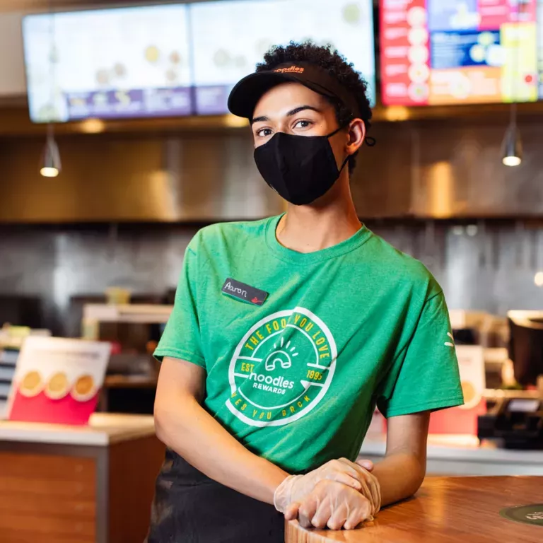 https://www.noodles.com/sites/default/files/styles/medium/public/2022-09/Noodles-Employee.png.webp?itok=9WGtrWDb