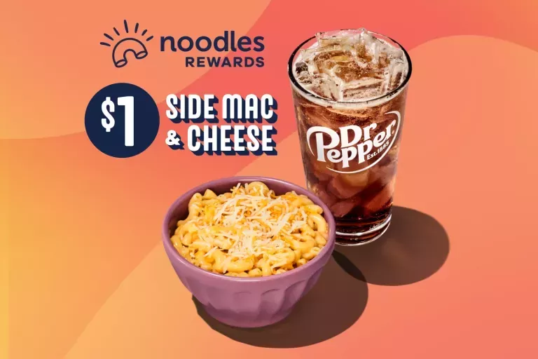 Noodles Rewards Members get $1 Side Mac &amp; Cheese. Side of mac and cheese in a pink bowl shown with a Dr. Pepper fountain drink.