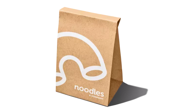 Noodles branded to-go bag