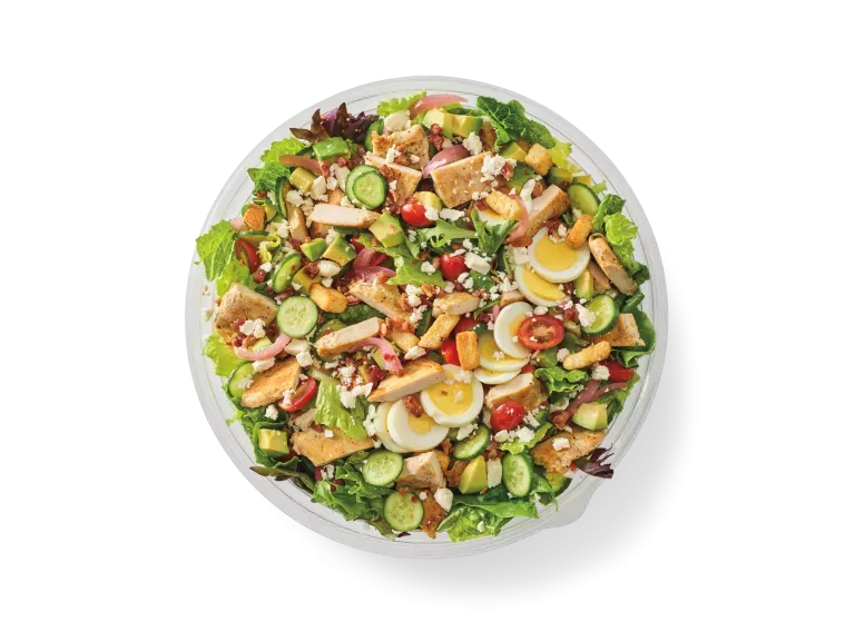 Large bowl of green goddess cobb salad with grilled chicken