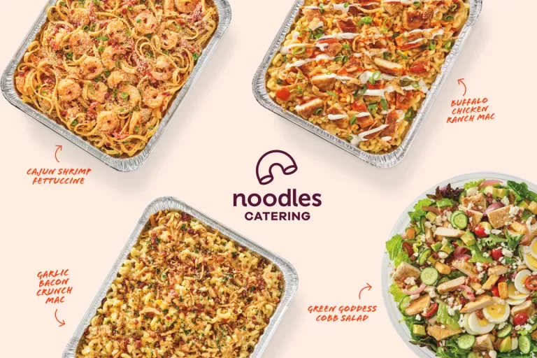 Noodles catering pans of Buffalo chicken ranch mac, cajun shrimp fettuccine, garlic bacon crunch mac and green goddess cobb salad.