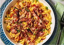 Tabletop image of Pulled Pork BBQ Mac and cheese and a fork