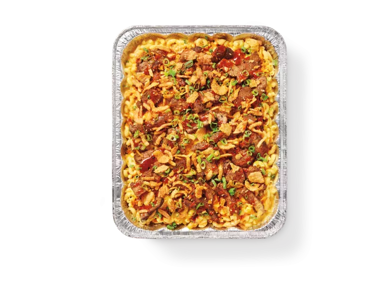 Catering pan of Bulgogi Steak Mac & Cheese.